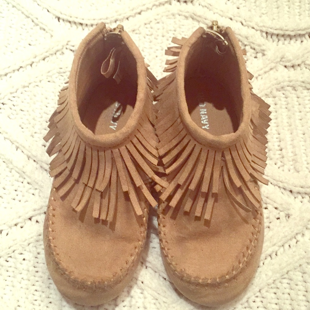 Moccasin style girls shoes.